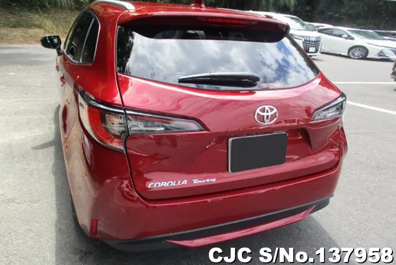 Toyota Corolla Touring in Red for Sale Image 1
